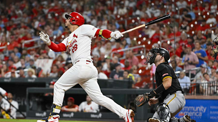 Sep 18, 2024; St. Louis, Missouri, USA; St. Louis Cardinals third baseman Nolan Arenado (28) hits a one run single against the Pittsburgh Pirates during the third inning at Busch Stadium. Mandatory Credit: Jeff Curry-Imagn Images Sep 18, 2024; St. Louis, Missouri, USA; St. Louis Cardinals third baseman Nolan Arenado (28) hits a one run single against the Pittsburgh Pirates during the third inning at Busch Stadium. Mandatory Credit: Jeff Curry-Imagn Images