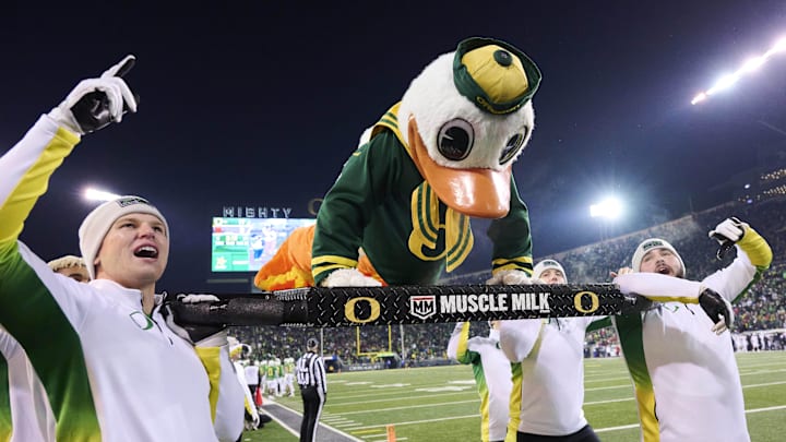 Nov 19, 2022; Eugene, Oregon, USA; Oregon Ducks mascot Puddles does push ups after an Oregon touchdown during the second half against the Utah Utes at Autzen Stadium. The Ducks won the game 20-17. Mandatory Credit: Troy Wayrynen-Imagn Images