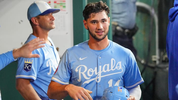 Sep 6, 2025; Kansas City, Missouri, USA; Kansas City Royals right fielder Jac Caglianone (14) celebrates in the dugout after scoring against the Minnesota Twins during the fourth inning at Kauffman Stadium. Mandatory Credit: Denny Medley-Imagn Images