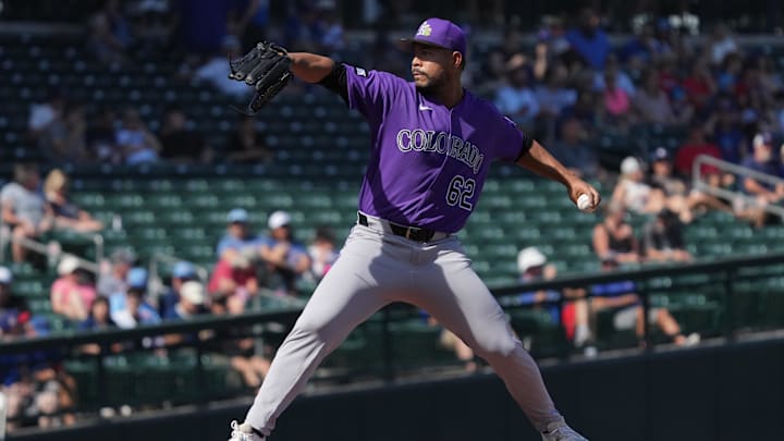 Feb 25, 2026; Mesa, Arizona, USA; Colorado Rockies pitcher Jose Quintana (62) throws against the Chicago Cubs in the first inning at Sloan Park. Mandatory Credit: Rick Scuteri-Imagn Images