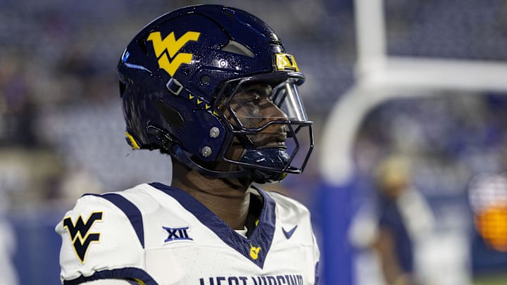 Oct 3, 2025; Provo, Utah, USA; West Virginia Mountaineers quarterback Khalil Wilkins (14) looks on before the game against the Brigham Young Cougars at LaVell Edwards Stadium. Mandatory Credit: Rob Gray-Imagn Images
