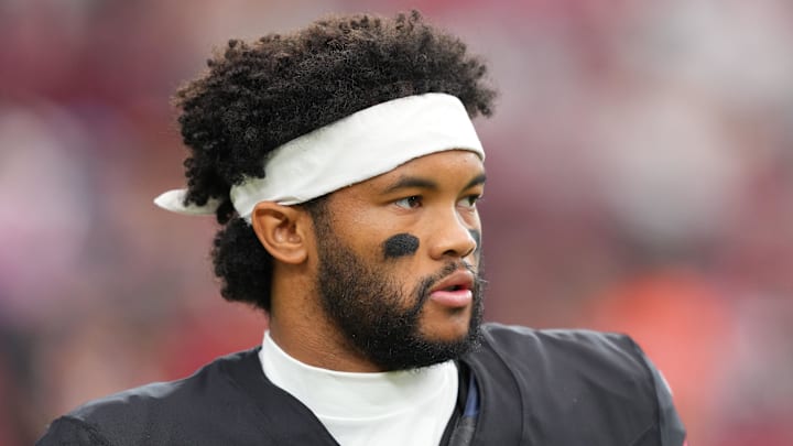 Oct 5, 2025; Glendale, Arizona, USA; Arizona Cardinals quarterback Kyler Murray (1) warms up before their game against the Tennessee Titans at State Farm Stadium. Mandatory Credit: Joe Camporeale-Imagn Images
