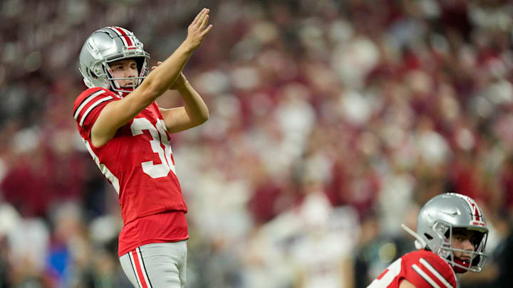 Ohio State Buckeyes kicker Jayden Fielding (38) lines up his kick Saturday, Dec. 6, 2025, during the Big Ten football championship against the Indiana Hoosiers at Lucas Oil Stadium in Indianapolis.