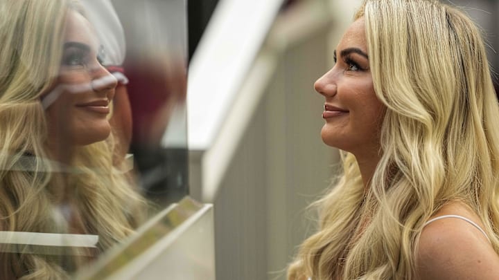 Chelsea Freeman the wife of Los Angeles Dodgers first baseman Freddie Freeman is shown talking to someone in the stands during a game. Chelsea Freeman the wife of Los Angeles Dodgers first baseman Freddie Freeman is shown talking to someone in the stands during a game.