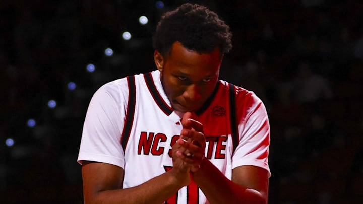 Dec 6, 2025; Raleigh, North Carolina, USA; NC State Wolfpack guard Quadir Copeland (11) reacts before the first half of the game against Liberty Flames at Lenovo Center. Mandatory Credit: Jaylynn Nash-Imagn Images