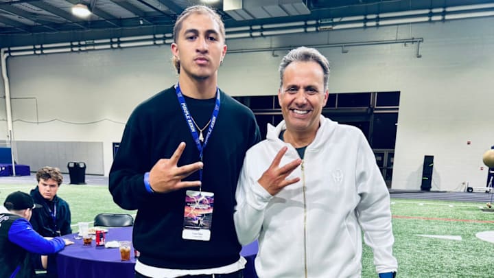 Linebacker Ezaya Tokio and Jedd Fisch pose for a recruiting moment. 