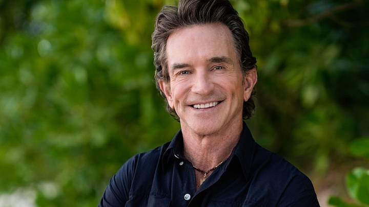 Jeff Probst smiling and posing for a Survivor promotional photo