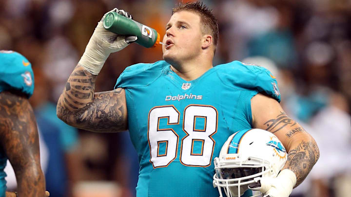 Miami Dolphins guard Richie Incognito (68) takes a drink during their game against the New Orleans Saints at the Mercedes-Benz Superdome in 2013. Miami Dolphins guard Richie Incognito (68) takes a drink during their game against the New Orleans Saints at the Mercedes-Benz Superdome in 2013.