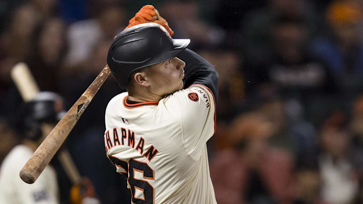 Sep 11, 2024; San Francisco, California, USA; San Francisco Giants third baseman Matt Chapman (26) hits a solo home run against the Milwaukee Brewers during the fourth inning at Oracle Park. 