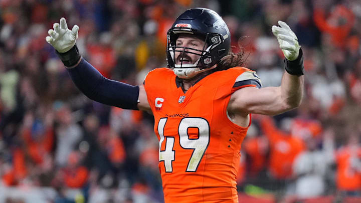 Dec 14, 2025; Denver, Colorado, USA; Denver Broncos linebacker Alex Singleton (49) celebrates defeating the Green Bay Packers during the fourth quarter at Empower Field at Mile High. Mandatory Credit: Ron Chenoy-Imagn Images
