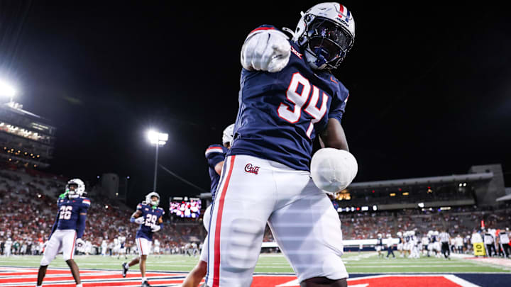 Aug 30, 2025; Tucson, Arizona, USA; Arizona Wildcats defensive lineman Eduwa Okundaye (94) points at the camera after kickoff during the third quarter of the game against the Hawaii Rainbow Warriors at Arizona Stadium. Mandatory Credit: Aryanna Frank-Imagn Images