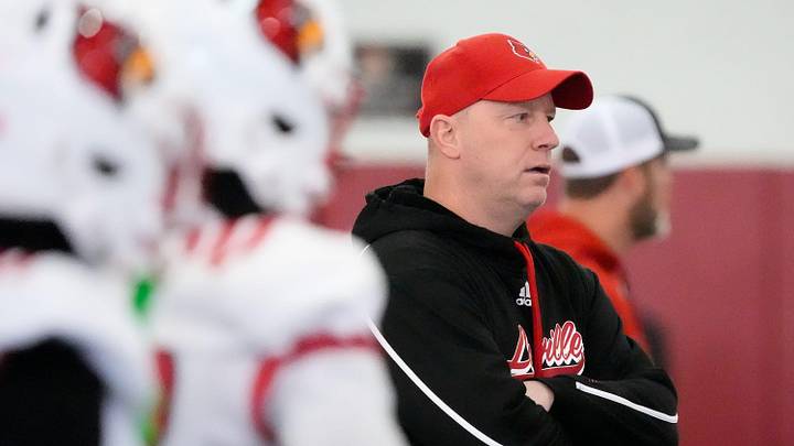 Louisville Football head coach Jeff Brohm looks over his teams during open practice. March 18, 2026 Louisville Football head coach Jeff Brohm looks over his teams during open practice. March 18, 2026