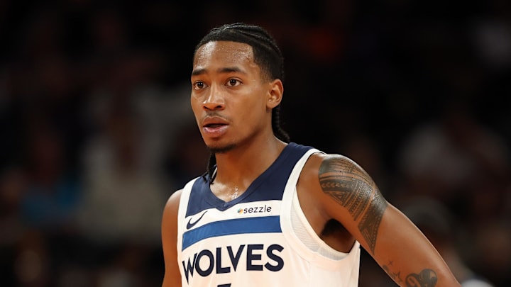 Nov 21, 2025; Phoenix, Arizona, USA; Minnesota Timberwolves guard Rob Dillingham (4) against the Phoenix Suns during an NBA Cup game at Mortgage Matchup Center. Mandatory Credit: Mark J. Rebilas-Imagn Images Nov 21, 2025; Phoenix, Arizona, USA; Minnesota Timberwolves guard Rob Dillingham (4) against the Phoenix Suns during an NBA Cup game at Mortgage Matchup Center. Mandatory Credit: Mark J. Rebilas-Imagn Images