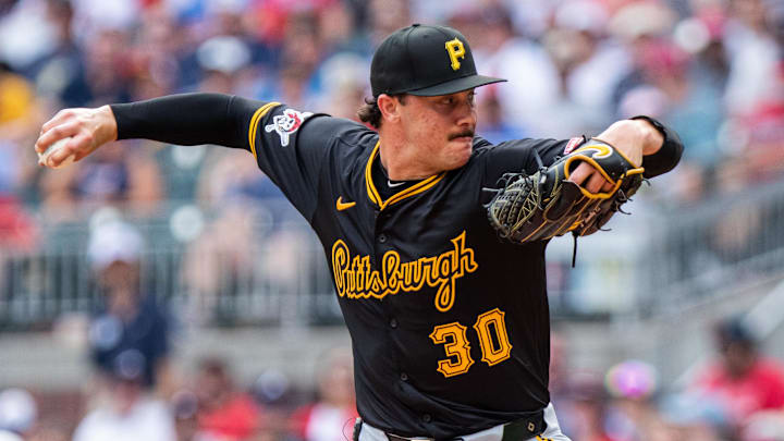 Pittsburgh Pirates pitcher Paul Skenes (30) pitches the ball against the Atlanta Braves during the fifth inning at Truist Park. 