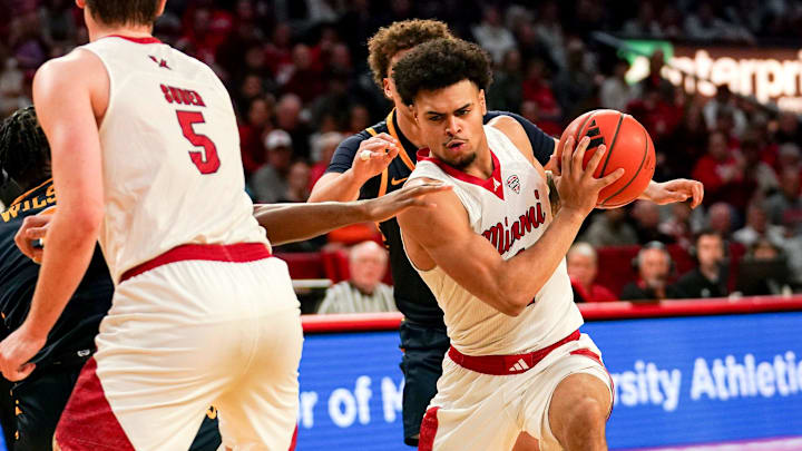 Miami (OH) RedHawks guard Trey Perry (1) handles the ball in the second half of a NCAA men’s basketball game between the Miami Redhawks and Toledo Rockets, Tuesday, March 3, 2026, at Millett Hall in Oxford, Oh. Redhawks won 74-72.