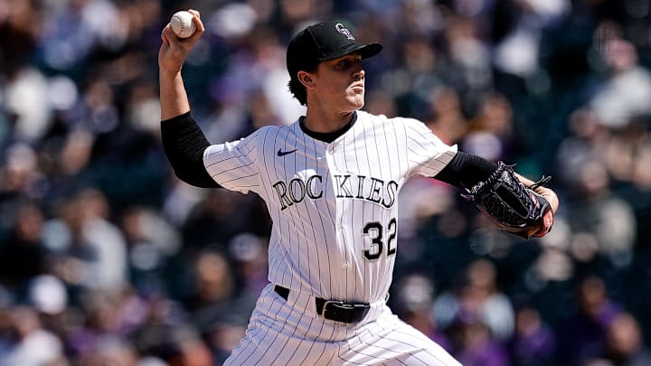 Apr 6, 2025; Denver, Colorado, USA; Colorado Rockies starting pitcher Chase Dollander (32) pitches in the first inning against the Athletics at Coors Field. Mandatory Credit: Isaiah J. Downing-Imagn Images