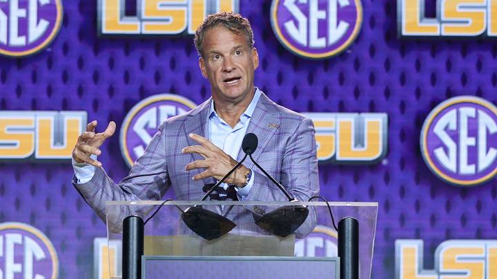 LSU Tigers head coach Lane Kiffin speaks to the press during SEC Football Kickoff Media Day at the Tampa Marriott. Mandatory Credit: Nathan Ray Seebeck-Imagn Images