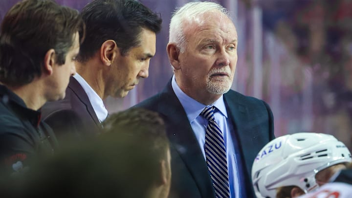 Mar 16, 2022; Calgary, Alberta, CAN; New Jersey Devils head coach Lindy Ruff on his bench during the first period against the Calgary Flames at Scotiabank Saddledome. Mandatory Credit: Sergei Belski-Imagn Images