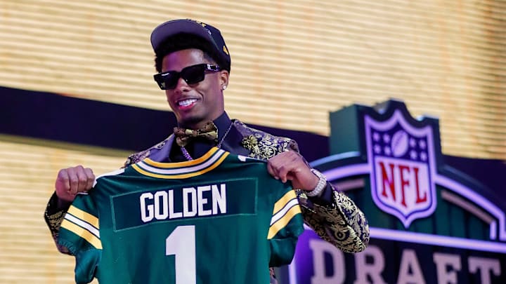 Wide receiver Matthew Golden holds a Green Bay Packers jersey after being selected with the 23rd pick during the first round of the 2025 NFL Draft on Thursday, April 24, 2025, at Lambeau Field in Green Bay, Wisconsin. The draft runs through April 26.