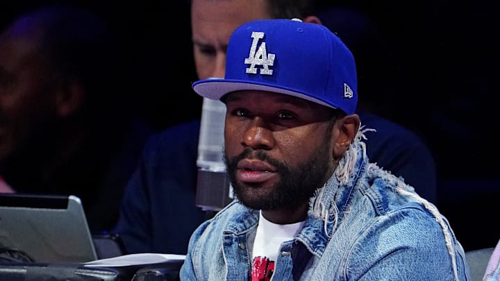 Dec 7, 2023; Las Vegas, Nevada, USA; Floyd Mayweather Jr. sits court side during the third quarter of the NBA In Season Tournament Semifinal between the Indiana Pacers and the Milwaukee Bucks at T-Mobile Arena. Mandatory Credit: Kyle Terada-Imagn Images