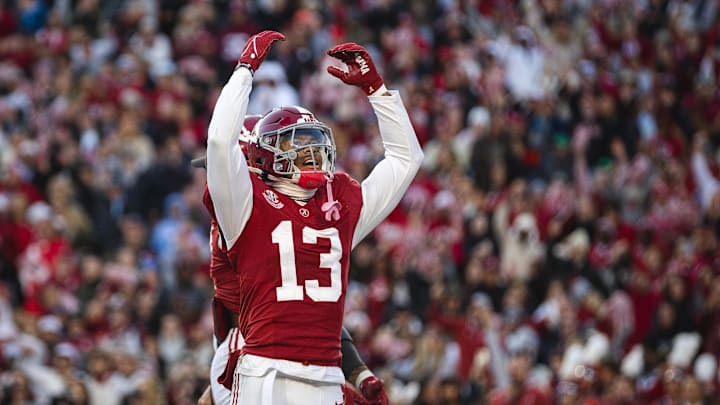 Nov 30, 2024; Tuscaloosa, Alabama, USA; Alabama Crimson Tide defensive back Malachi Moore (13) celebrates after a play against the Auburn Tigers during the second quarter at Bryant-Denny Stadium. Mandatory Credit: Will McLelland-Imagn Images