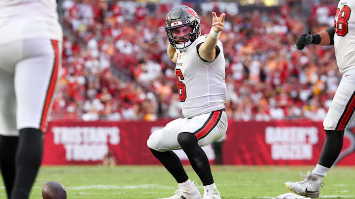 Sep 8, 2024; Tampa, Florida, USA; Tampa Bay Buccaneers quarterback Baker Mayfield (6) reacts after a first down against the Washington Commanders in the fourth quarter at Raymond James Stadium. Mandatory Credit: Nathan Ray Seebeck-Imagn Images
