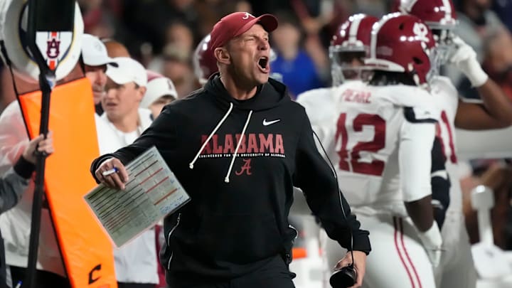 Nov 29, 2025; Auburn, Alabama, USA; Alabama head coach Kalen DeBoer protests a personal foul call against the Crimson Tide during the game with Auburn at Jordan-Hare Stadium. Mandatory Credit: Gary Cosby Jr.-Tuscaloosa News Nov 29, 2025; Auburn, Alabama, USA; Alabama head coach Kalen DeBoer protests a personal foul call against the Crimson Tide during the game with Auburn at Jordan-Hare Stadium. Mandatory Credit: Gary Cosby Jr.-Tuscaloosa News