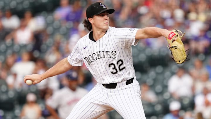 Jul 1, 2025; Denver, Colorado, USA; Colorado Rockies starting pitcher Chase Dollander (32) delivers a pitch against the Houston Astros in the first inning at Coors Field Jul 1, 2025; Denver, Colorado, USA; Colorado Rockies starting pitcher Chase Dollander (32) delivers a pitch against the Houston Astros in the first inning at Coors Field