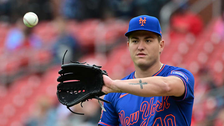 May 4, 2025; St. Louis, Missouri, USA; The ball is returned to New York Mets pitcher Blade Tidwell (40) in the first inning against the St. Louis Cardinals at Busch Stadium. Mandatory Credit: Tim Vizer-Imagn Images