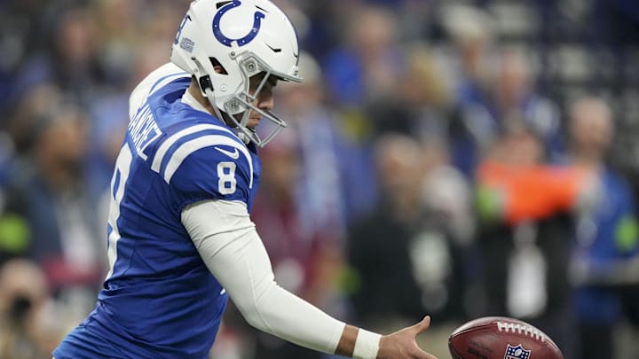 Jan 6, 2024; Indianapolis, Indiana, USA; Indianapolis Colts punter Rigoberto Sanchez (8) punts the ball against the Houston Texans at Lucas Oil Stadium. Mandatory Credit: Robert Scheer-Imagn Images