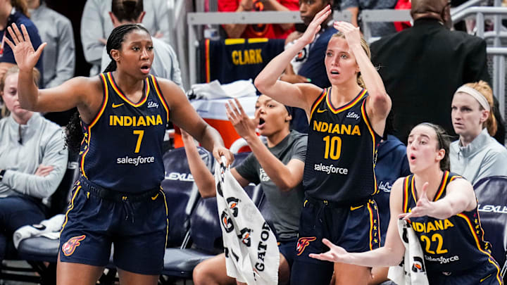 Indiana Fever forward Aliyah Boston (7), Indiana Fever guard Lexie Hull (10) and Indiana Fever guard Caitlin Clark (22) react to the action Tuesday, June 17, 2025, during a game between the Indiana Fever and the Connecticut Sun at Gainbridge Fieldhouse in Indianapolis. The Indiana Fever defeated the Connecticut Sun, 88-71.