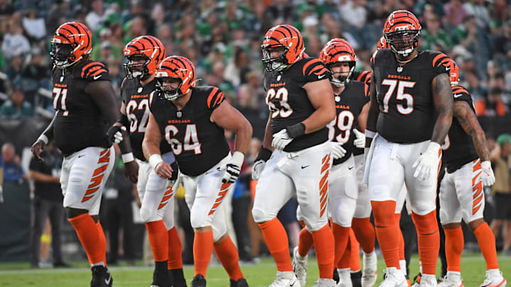 Aug 7, 2025; Philadelphia, Pennsylvania, USA; Cincinnati Bengals offensive tackle Amarius Mims (71), guard Lucas Patrick (62), center Ted Karras (64), guard Dylan Fairchild (63) and offensive tackle Orlando Brown Jr. (75) against the Philadelphia Eagles at Lincoln Financial Field. Mandatory Credit: Eric Hartline-Imagn Images Aug 7, 2025; Philadelphia, Pennsylvania, USA; Cincinnati Bengals offensive tackle Amarius Mims (71), guard Lucas Patrick (62), center Ted Karras (64), guard Dylan Fairchild (63) and offensive tackle Orlando Brown Jr. (75) against the Philadelphia Eagles at Lincoln Financial Field. Mandatory Credit: Eric Hartline-Imagn Images