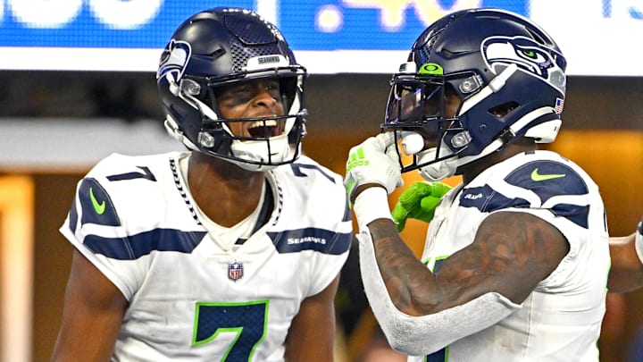 Dec 4, 2022; Inglewood, California, USA;  Seattle Seahawks quarterback Geno Smith (7) celebrates with wide receiver DK Metcalf (14) after a touchdown in the fourth quarter against the Los Angeles Rams at SoFi Stadium. Mandatory Credit: Jayne Kamin-Oncea-Imagn Images
