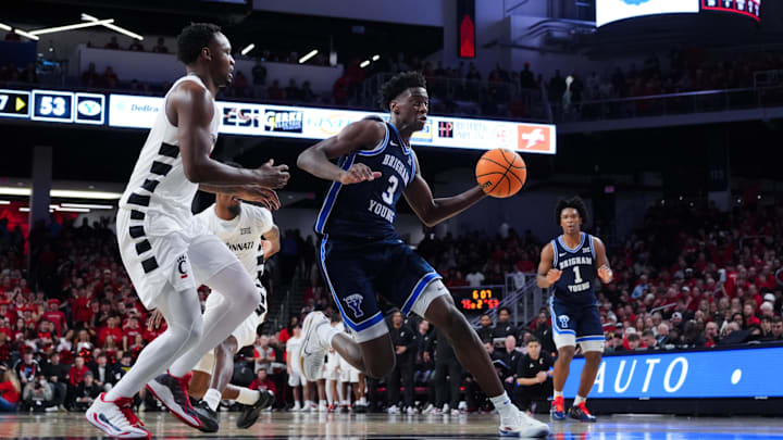 Mar 3, 2026; Cincinnati, Ohio, USA;  BYU Cougars forward AJ Dybantsa (3) drives to the basket against Cincinnati Bearcats forward Jalen Celestine (32) in the second half at Fifth Third Arena. Mandatory Credit: Aaron Doster-Imagn Images