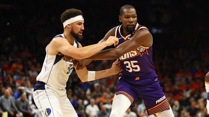 Oct 26, 2024; Phoenix, Arizona, USA; Phoenix Suns forward Kevin Durant (35) against Dallas Mavericks guard Klay Thompson (31) in the first half of the home opener at Footprint Center. Mandatory Credit: Mark J. Rebilas-Imagn Images Oct 26, 2024; Phoenix, Arizona, USA; Phoenix Suns forward Kevin Durant (35) against Dallas Mavericks guard Klay Thompson (31) in the first half of the home opener at Footprint Center. Mandatory Credit: Mark J. Rebilas-Imagn Images