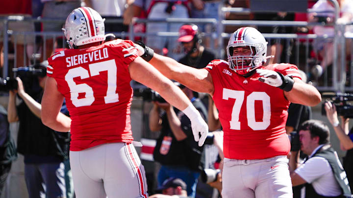 Sep 21, 2024; Columbus, Ohio, USA; Ohio State Buckeyes offensive lineman Josh Fryar (70) celebrates with offensive lineman Austin Siereveld (67) in the second quarter at Ohio Stadium on Saturday.