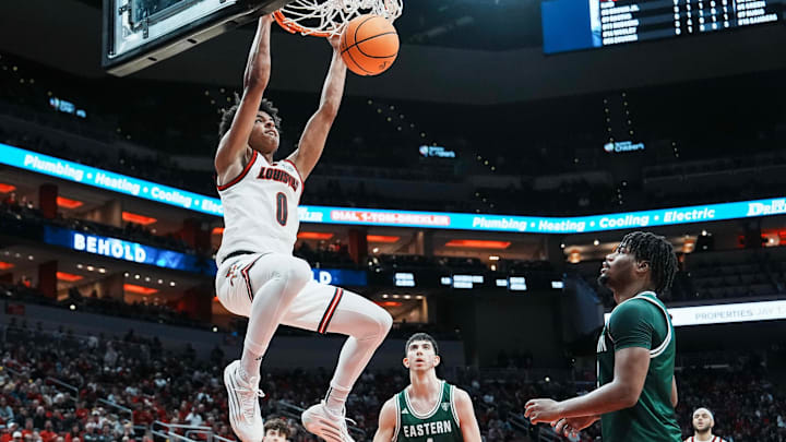 Louisville Cardinals guard Mikel Brown Jr. (0) slams down two points against Eastern Michigan Monday night, Nov. 24, 2025 at the KFC Yum! Center in Louisville, Kentucky.