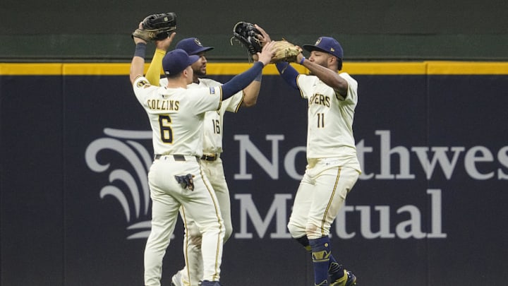 Sep 18, 2025; Milwaukee, Wisconsin, USA; Milwaukee Brewers outfielder Isaac Collins (6) Milwaukee Brewers outfielder Blake Perkins (16) and Milwaukee Brewers outfielder Jackson Chourio (11) celebrate a 5-2 win over the Los Angeles Angels  at American Family Field. Mandatory Credit: Michael McLoone-Imagn Images Sep 18, 2025; Milwaukee, Wisconsin, USA; Milwaukee Brewers outfielder Isaac Collins (6) Milwaukee Brewers outfielder Blake Perkins (16) and Milwaukee Brewers outfielder Jackson Chourio (11) celebrate a 5-2 win over the Los Angeles Angels  at American Family Field. Mandatory Credit: Michael McLoone-Imagn Images