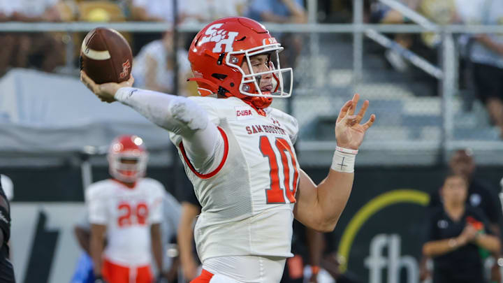 Sep 7, 2024; Orlando, Florida, USA; Sam Houston State Bearkats quarterback Hunter Watson (10) passes the ball during the first quarter against the UCF Knights at FBC Mortgage Stadium. Mandatory Credit: Mike Watters-Imagn Images