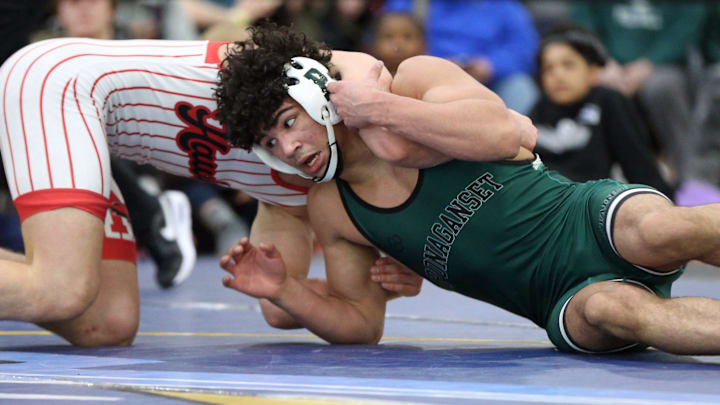 Carnell Davis, right, competes for the Ponaganset wrestling squad.