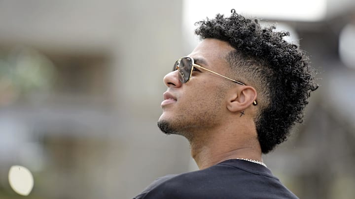 Apr 20, 2024; Tallahassee, Florida, USA; Florida State Seminoles quarterback Jordan Travis (13) enjoys the Spring Showcase at Doak S. Campbell Stadium. Mandatory Credit: Melina Myers-Imagn Images Apr 20, 2024; Tallahassee, Florida, USA; Florida State Seminoles quarterback Jordan Travis (13) enjoys the Spring Showcase at Doak S. Campbell Stadium. Mandatory Credit: Melina Myers-Imagn Images