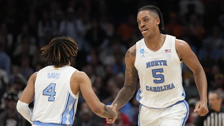 March 23, 2024, Charlotte, NC, USA; North Carolina Tar Heels forward Armando Bacot (5) and North