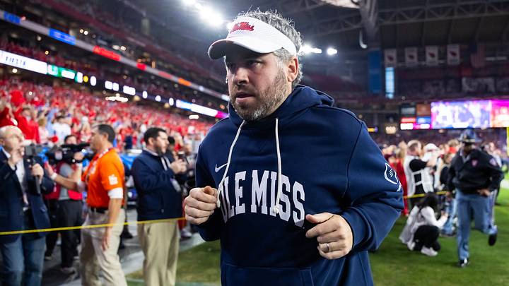 Jan 8, 2026; Glendale, AZ, USA; Mississippi Rebels head coach Pete Golding against the Miami Hurricanes during the 2026 Fiesta Bowl and semifinal game of the College Football Playoff at State Farm Stadium. Mandatory Credit: Mark J. Rebilas-Imagn Images Jan 8, 2026; Glendale, AZ, USA; Mississippi Rebels head coach Pete Golding against the Miami Hurricanes during the 2026 Fiesta Bowl and semifinal game of the College Football Playoff at State Farm Stadium. Mandatory Credit: Mark J. Rebilas-Imagn Images