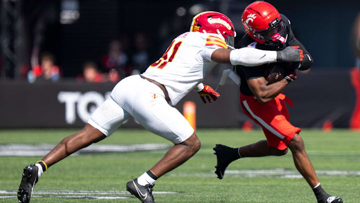 Cincinnati Bearcats wide receiver  (4) is forced out of bounds by Iowa State Cyclones defensive back  (31) in the second quarter of the NCAA football game between the Cincinnati Bearcats and Iowa State Cyclones at Nippert Stadium in Cincinnati on Oct. 4, 2025.