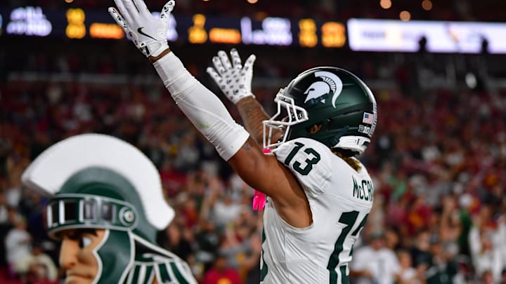 Sep 20, 2025; Los Angeles, California, USA; Michigan State Spartans wide receiver Chrishon McCray (13) celebrates his touchdown scored against the against the Southern California Trojans during the first half at the Los Angeles Memorial Coliseum. 