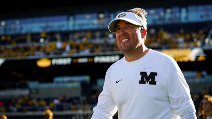 Oct 21, 2023; Columbia, Missouri, USA; Missouri Tigers head coach Eliah Drinkwitz takes the field for the second half against the South Carolina Gamecocks at Faurot Field at Memorial Stadium. Mandatory Credit: Jay Biggerstaff-Imagn Images