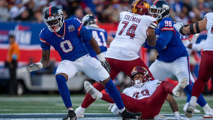 New York Giants linebacker Brian Burns (0) rushes past the offensive line during a game between the New York Giants and the Washington Commanders at MetLife Stadium in East Rutherford on Sunday, Nov. 3, 2024.