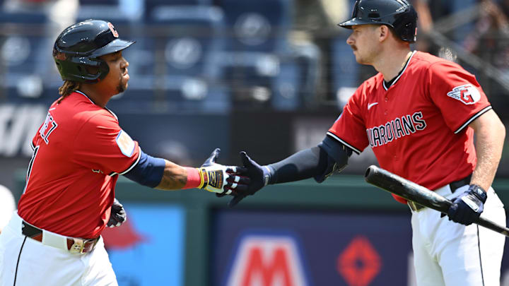 Aug 3, 2025; Cleveland, Ohio, USA; Cleveland Guardians third baseman Jose Ramirez (11) celebrates with first baseman Kyle Manzardo (9) after hitting a home run during the first inning against the Minnesota Twins at Progressive Field. Mandatory Credit: Ken Blaze-Imagn Images