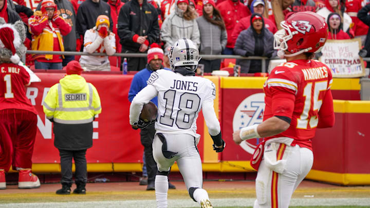 Dec 25, 2023; Kansas City, Missouri, USA; Las Vegas Raiders cornerback Jack Jones (18) scores on a