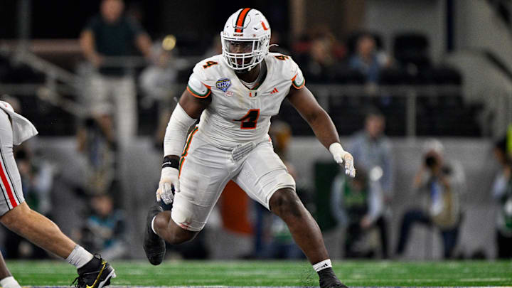Dec 31, 2025; Arlington, TX, USA; Miami Hurricanes defensive lineman Rueben Bain Jr. (4) rushes the line during the 2025 Cotton Bowl and quarterfinal game of the College Football Playoff at AT&T Stadium. Mandatory Credit: Jerome Miron-Imagn Images Dec 31, 2025; Arlington, TX, USA; Miami Hurricanes defensive lineman Rueben Bain Jr. (4) rushes the line during the 2025 Cotton Bowl and quarterfinal game of the College Football Playoff at AT&T Stadium. Mandatory Credit: Jerome Miron-Imagn Images